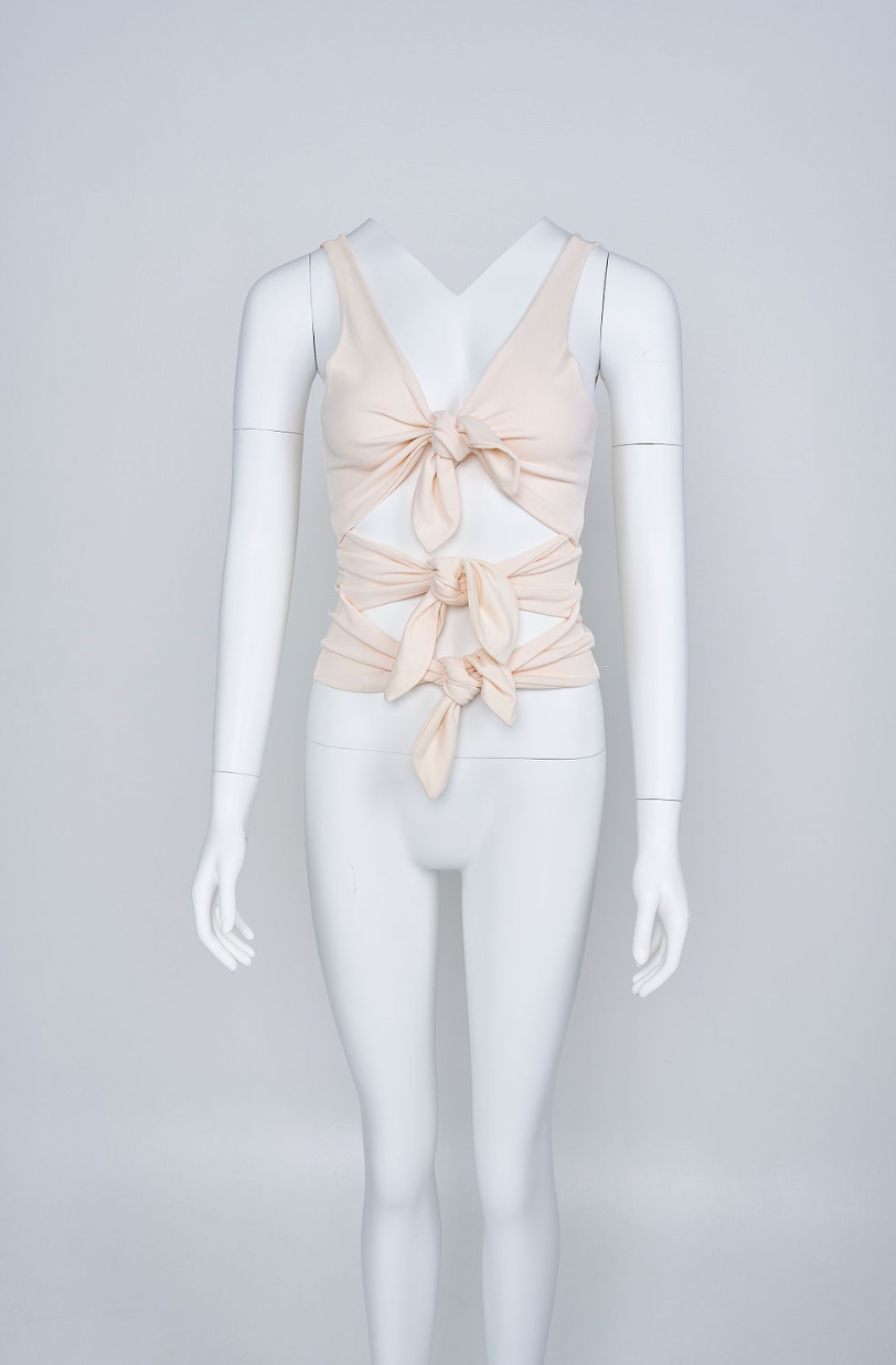 Preowned Valentino 2002 Ivory silk top with multiple tie details and deep V neckline - Pulled